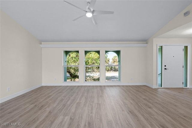 unfurnished living room with ceiling fan and light wood-type flooring