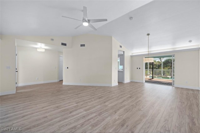 unfurnished living room with vaulted ceiling, ceiling fan, and light wood-type flooring