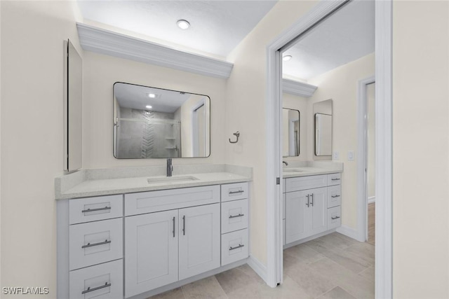 bathroom with vanity and an enclosed shower