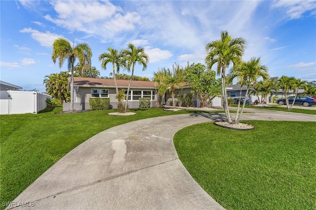 ranch-style house with a front yard