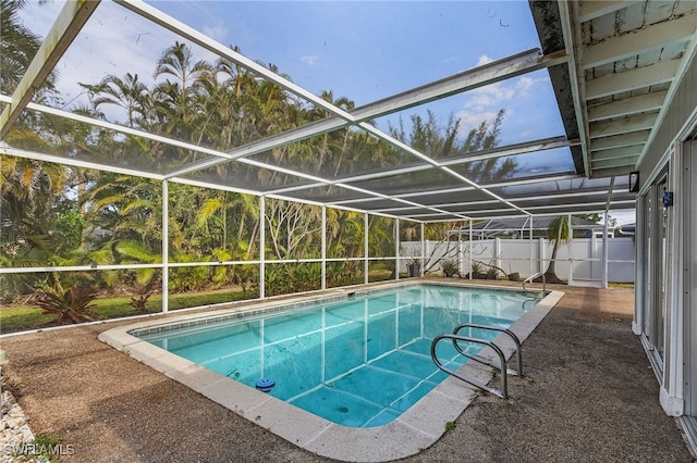 view of pool featuring a lanai