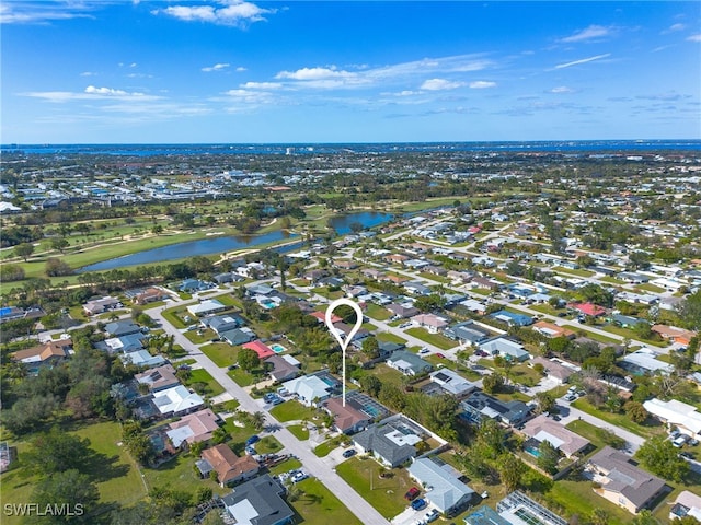 drone / aerial view featuring a water view