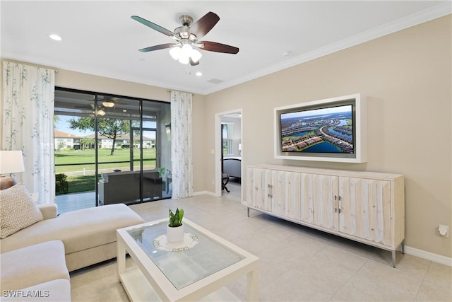 tiled living room featuring ornamental molding and ceiling fan