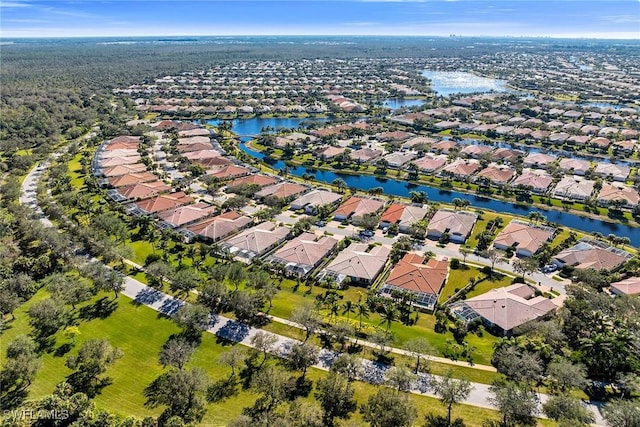 bird's eye view with a water view