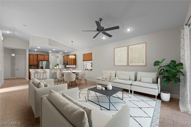 living room with a ceiling fan, recessed lighting, vaulted ceiling, and light tile patterned floors