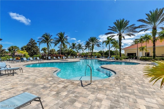 community pool with a patio