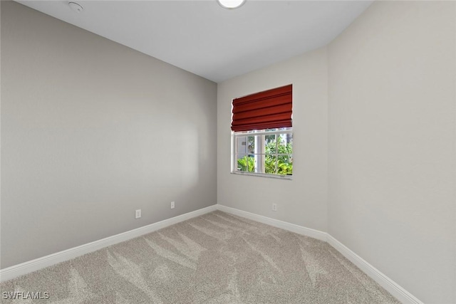 empty room featuring carpet flooring