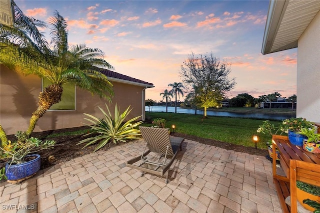 view of patio / terrace featuring a water view