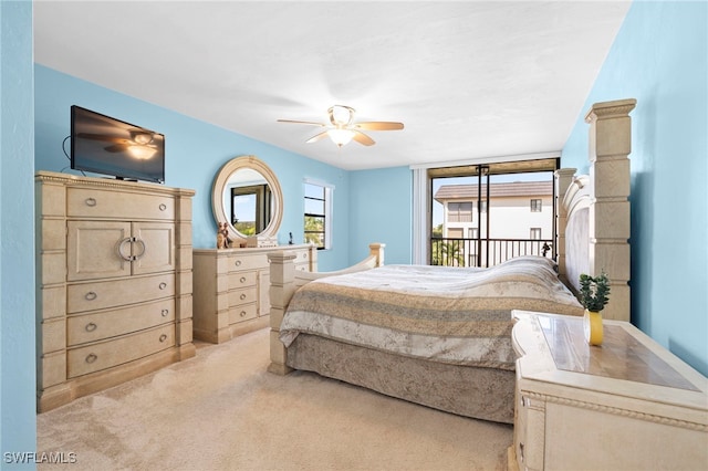 bedroom featuring ceiling fan, access to exterior, and light carpet