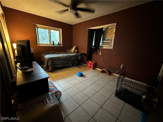 tiled bedroom featuring cooling unit and ceiling fan