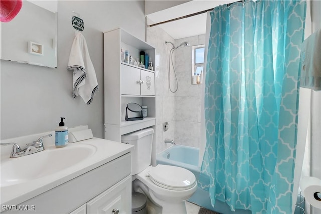 full bathroom with shower / bath combo, vanity, and toilet