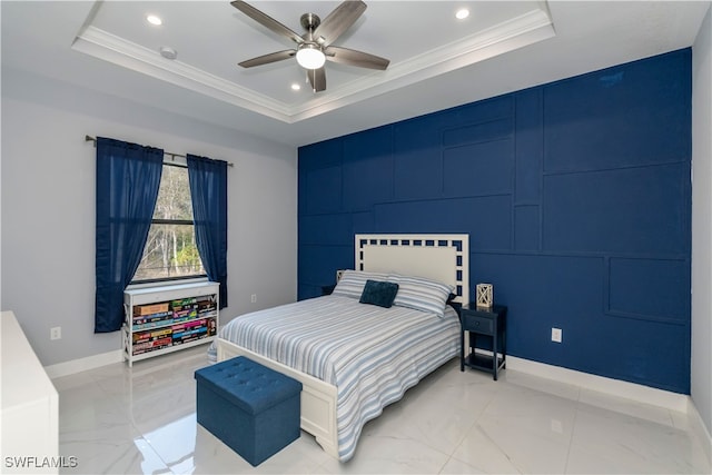 bedroom with crown molding, ceiling fan, and a raised ceiling