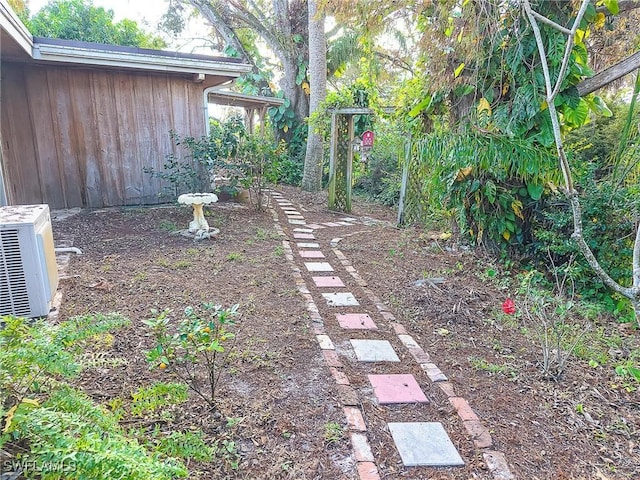 view of yard featuring ac unit