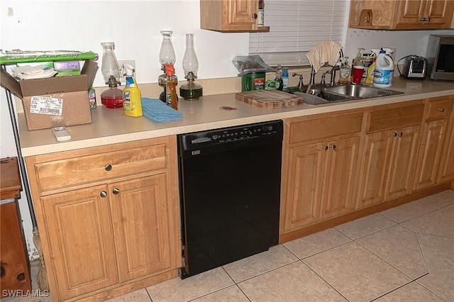 kitchen with sink, dishwasher, and light tile patterned flooring