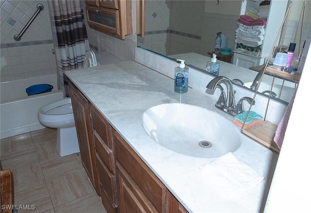 full bathroom featuring vanity, shower / tub combo, and toilet