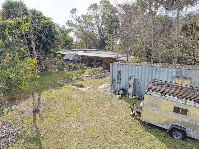 15323 E State Road 78, Okeechobee, FL 34974 - view of yard with an outbuilding and an outdoor structure
