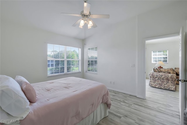 bedroom featuring ceiling fan and light hardwood / wood-style flooring