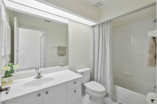 full bathroom with toilet, vanity, and shower / bathtub combination with curtain