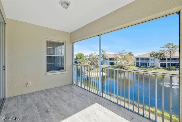 exterior space with a water view