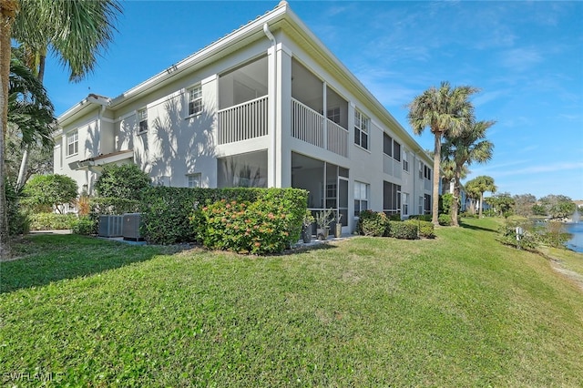 view of property exterior featuring a lawn