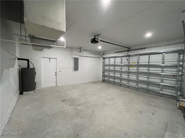 garage with a garage door opener, electric panel, and electric water heater