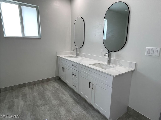 bathroom featuring vanity and hardwood / wood-style floors