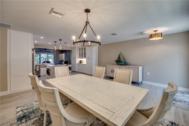 dining area featuring light hardwood / wood-style flooring