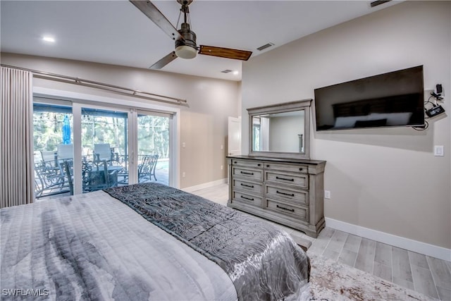 bedroom featuring ceiling fan, light wood-type flooring, and access to outside