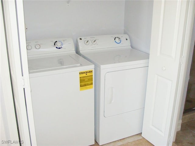 laundry area featuring independent washer and dryer