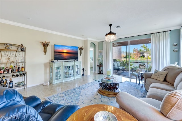 living room featuring ornamental molding and light tile patterned flooring