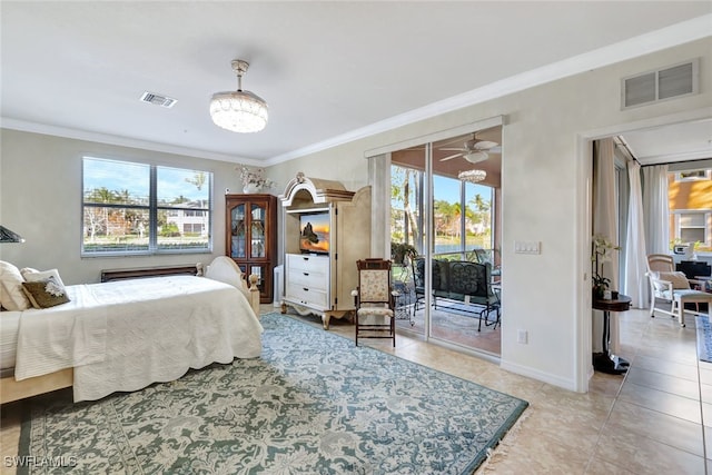 bedroom with ornamental molding, light tile patterned floors, multiple windows, and access to exterior