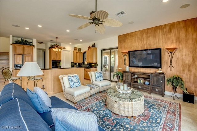 living room featuring ceiling fan