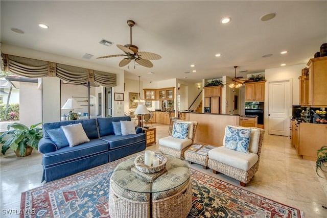 living room with ceiling fan