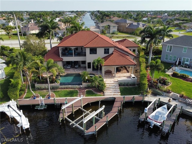 drone / aerial view with a water view