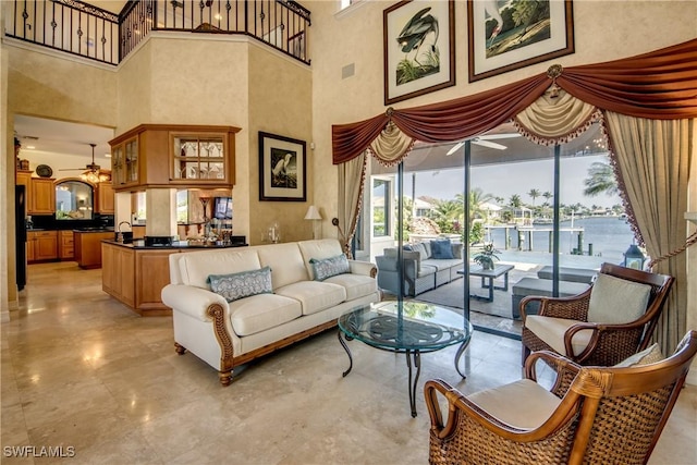 living room with ceiling fan