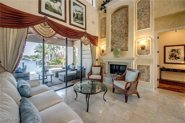 sitting room with a high ceiling