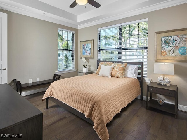 bedroom with multiple windows, ornamental molding, dark hardwood / wood-style floors, and ceiling fan