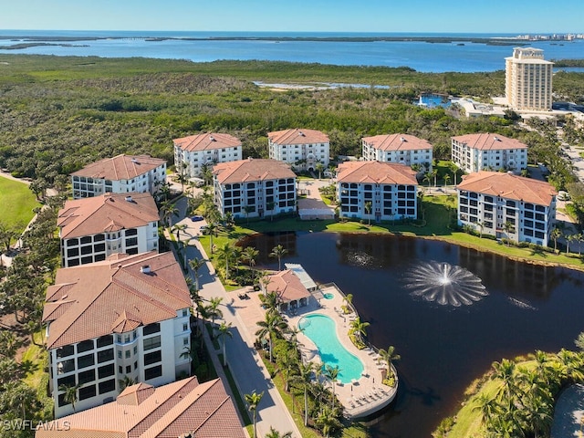 bird's eye view with a water view