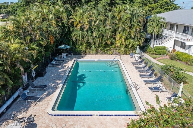 view of pool featuring a patio area