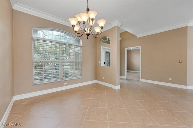 tiled spare room featuring crown molding and a chandelier