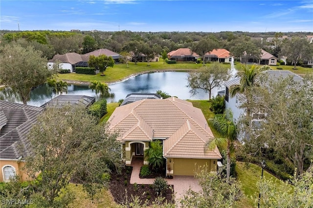 drone / aerial view with a water view