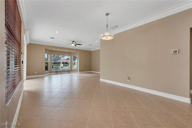 tiled empty room with ornamental molding and ceiling fan