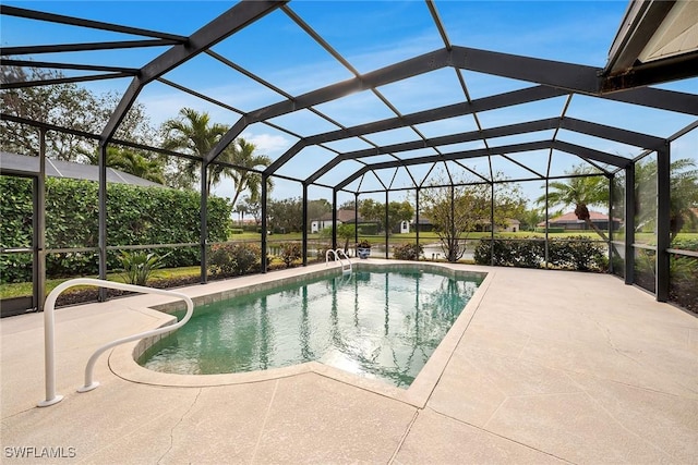 view of pool with a lanai and a patio area