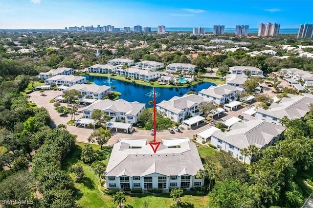 drone / aerial view with a water view