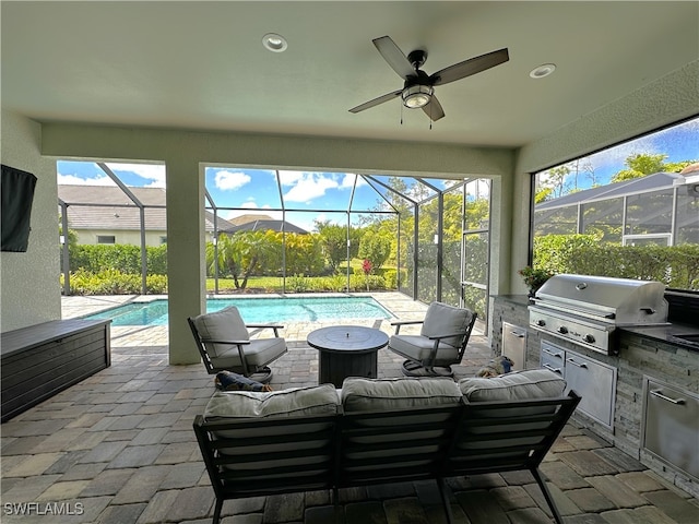 view of patio with a lanai, grilling area, area for grilling, and an outdoor hangout area