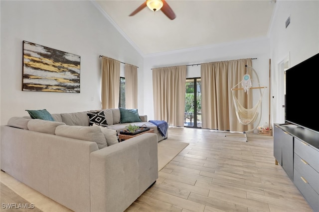 living room featuring crown molding, light hardwood / wood-style flooring, high vaulted ceiling, and ceiling fan