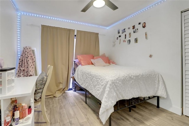 bedroom featuring ceiling fan and light wood-type flooring