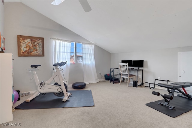 workout room with carpet floors and vaulted ceiling