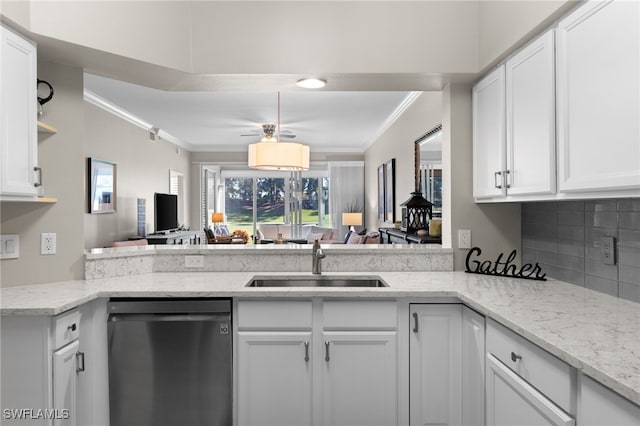 kitchen with sink, crown molding, dishwasher, white cabinetry, and kitchen peninsula