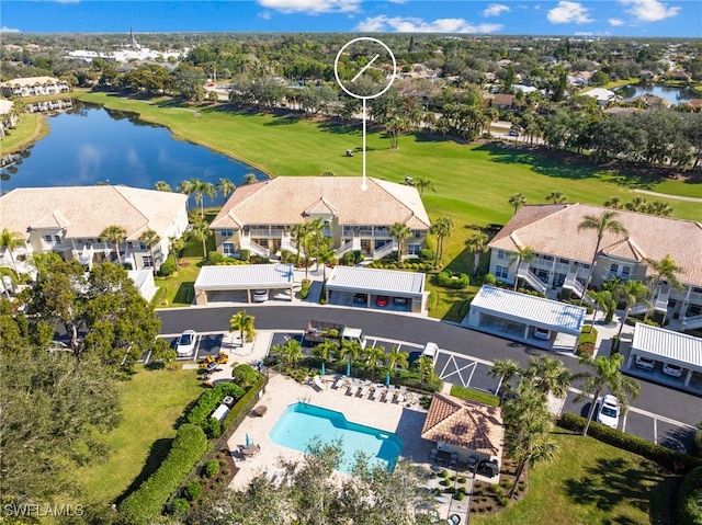 bird's eye view with a water view